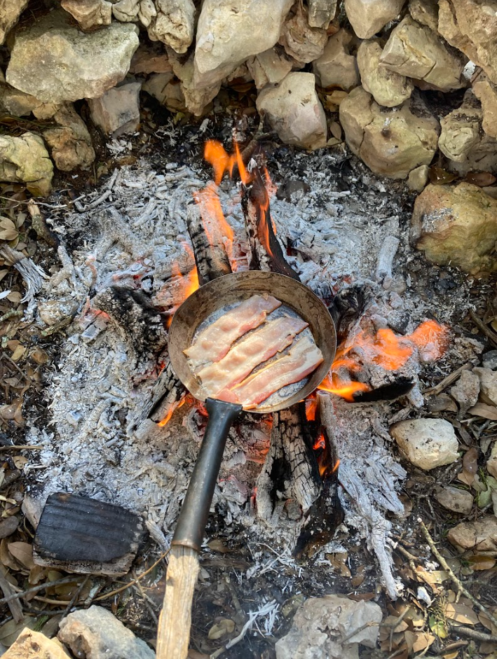 Cooking Bacon on the campfire